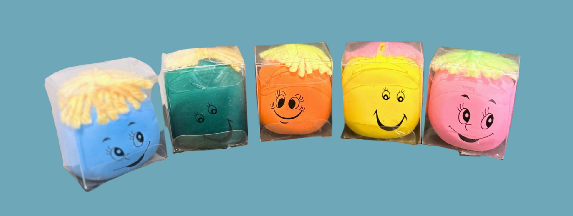 multi coloured squish stress balls with funny faces