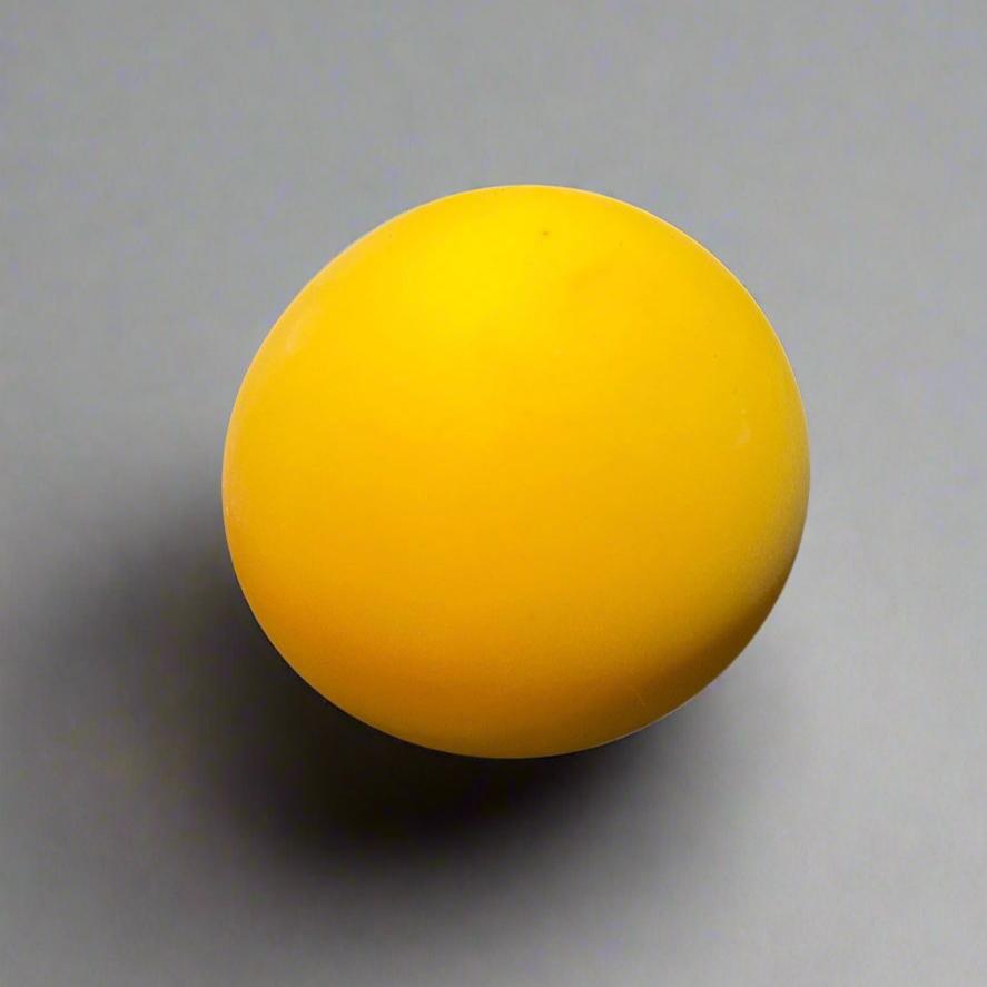 Yellow squeezee ball