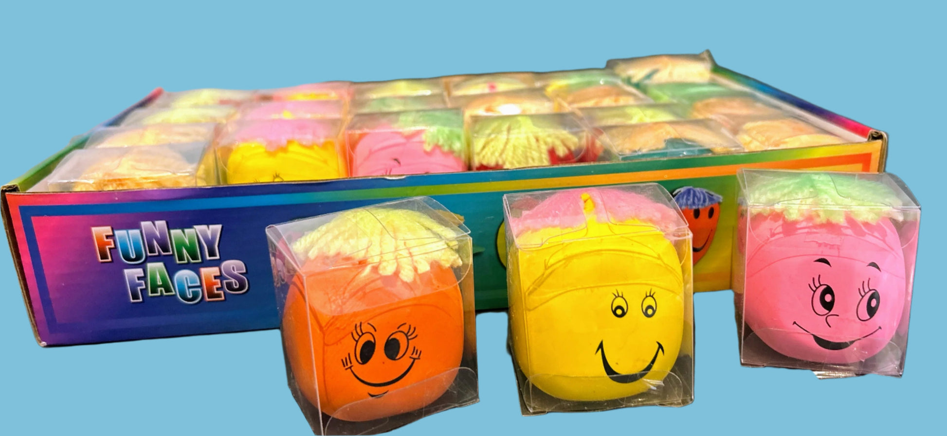 multi coloured squish stress balls with funny faces